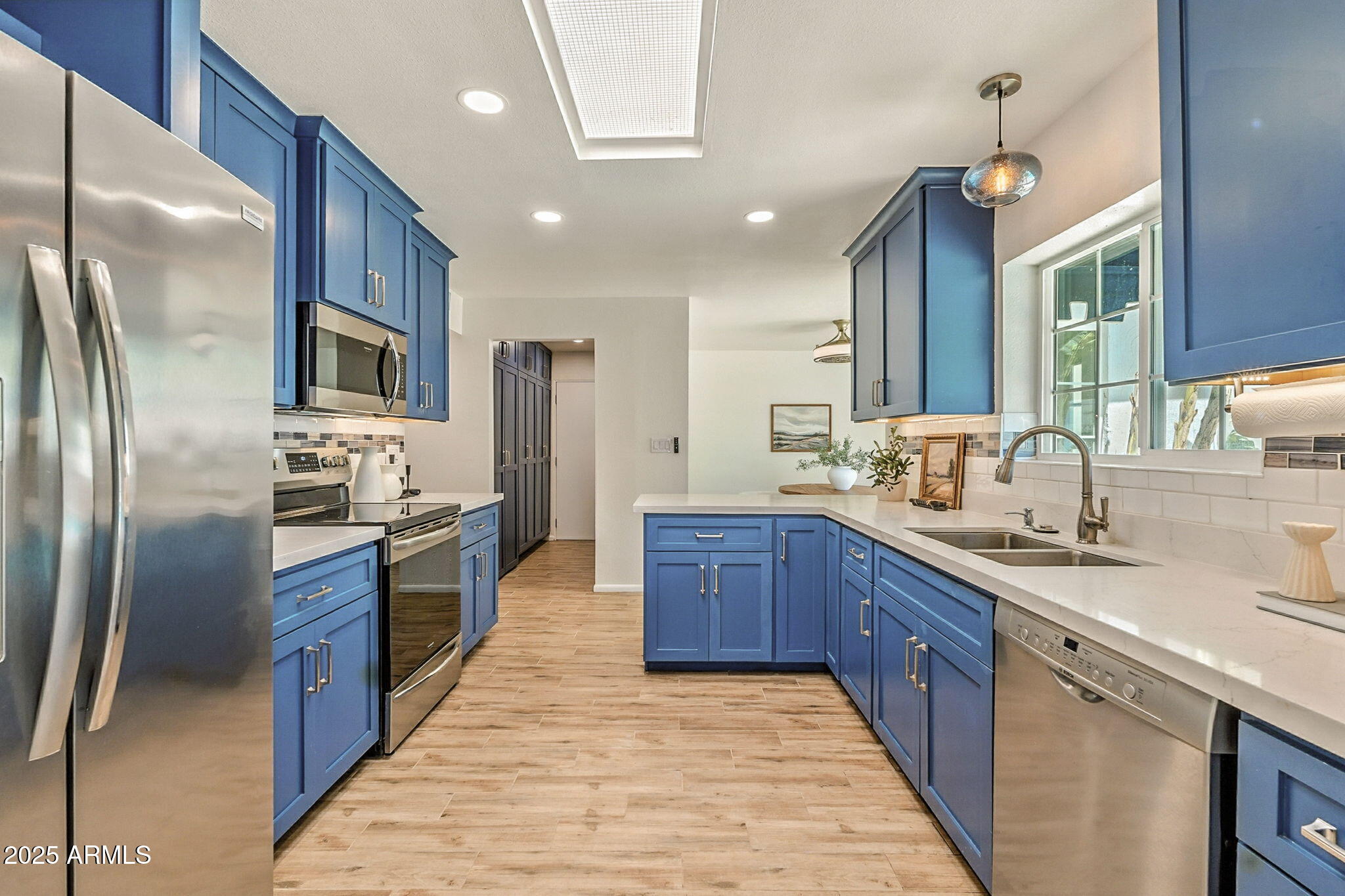 43 East Boca Raton Road Phoenix, AZ 85022 - Photo 23 of 99 a large kitchen with stainless steel appliances granite countertop a refrigerator a sink dishwasher a oven and a refrigerator