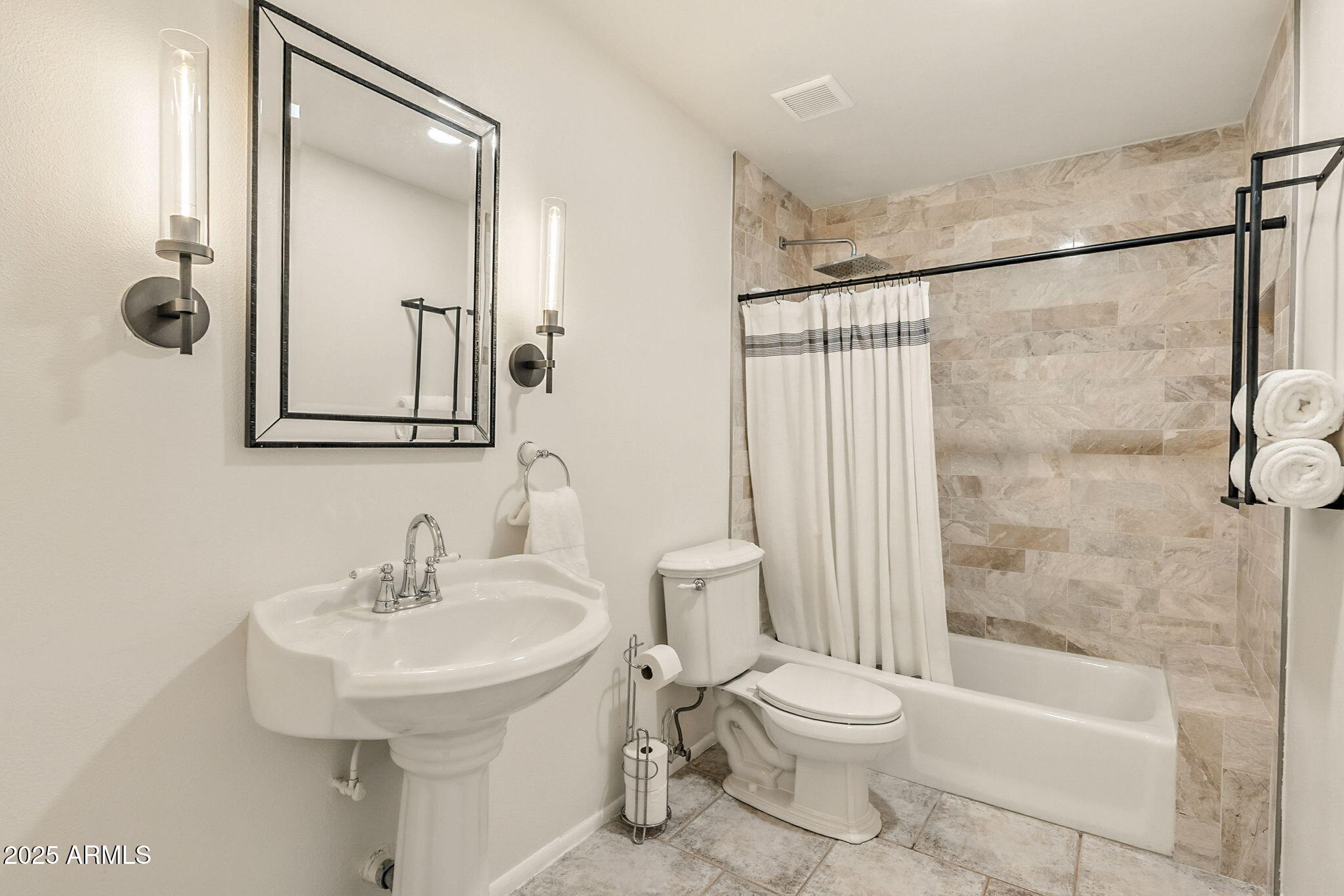 43 East Boca Raton Road Phoenix, AZ 85022 - Photo 43 of 99 a bathroom with a toilet a sink and a bathtub