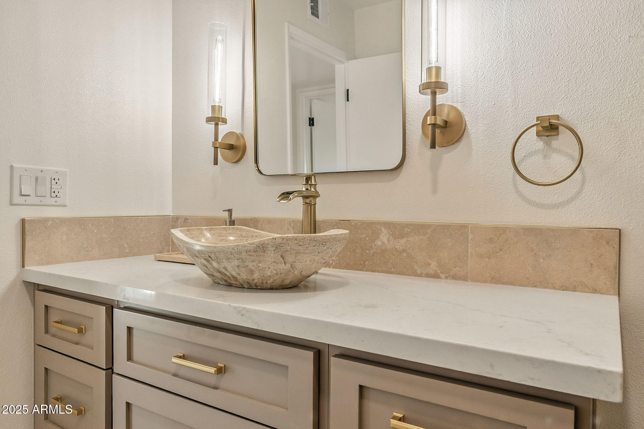 43 East Boca Raton Road Phoenix, AZ 85022 - Photo 53 of 99 a bathroom with a sink and a mirror