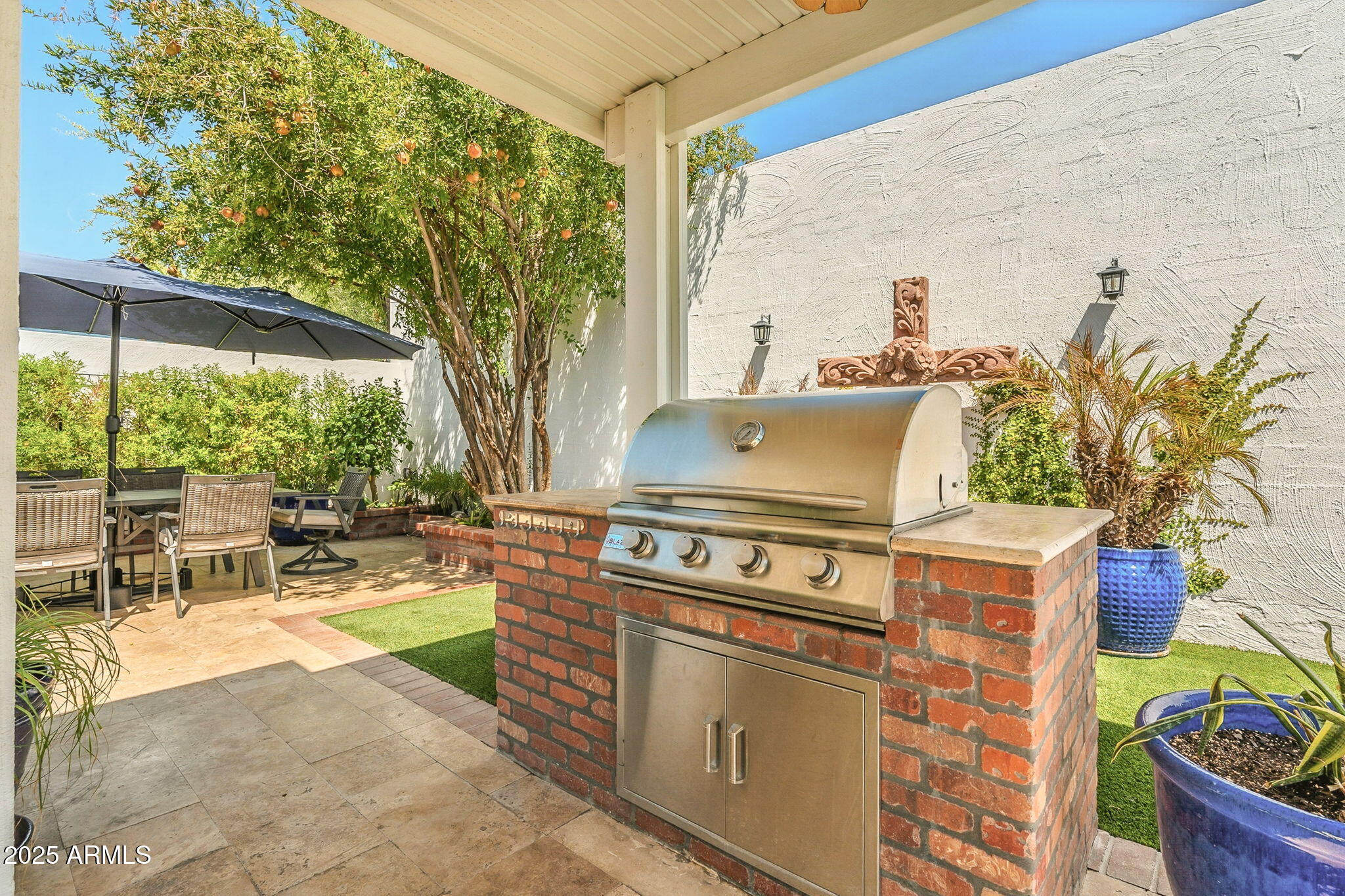 43 East Boca Raton Road Phoenix, AZ 85022 - Photo 69 of 99 a view of a chairs and table in the patio