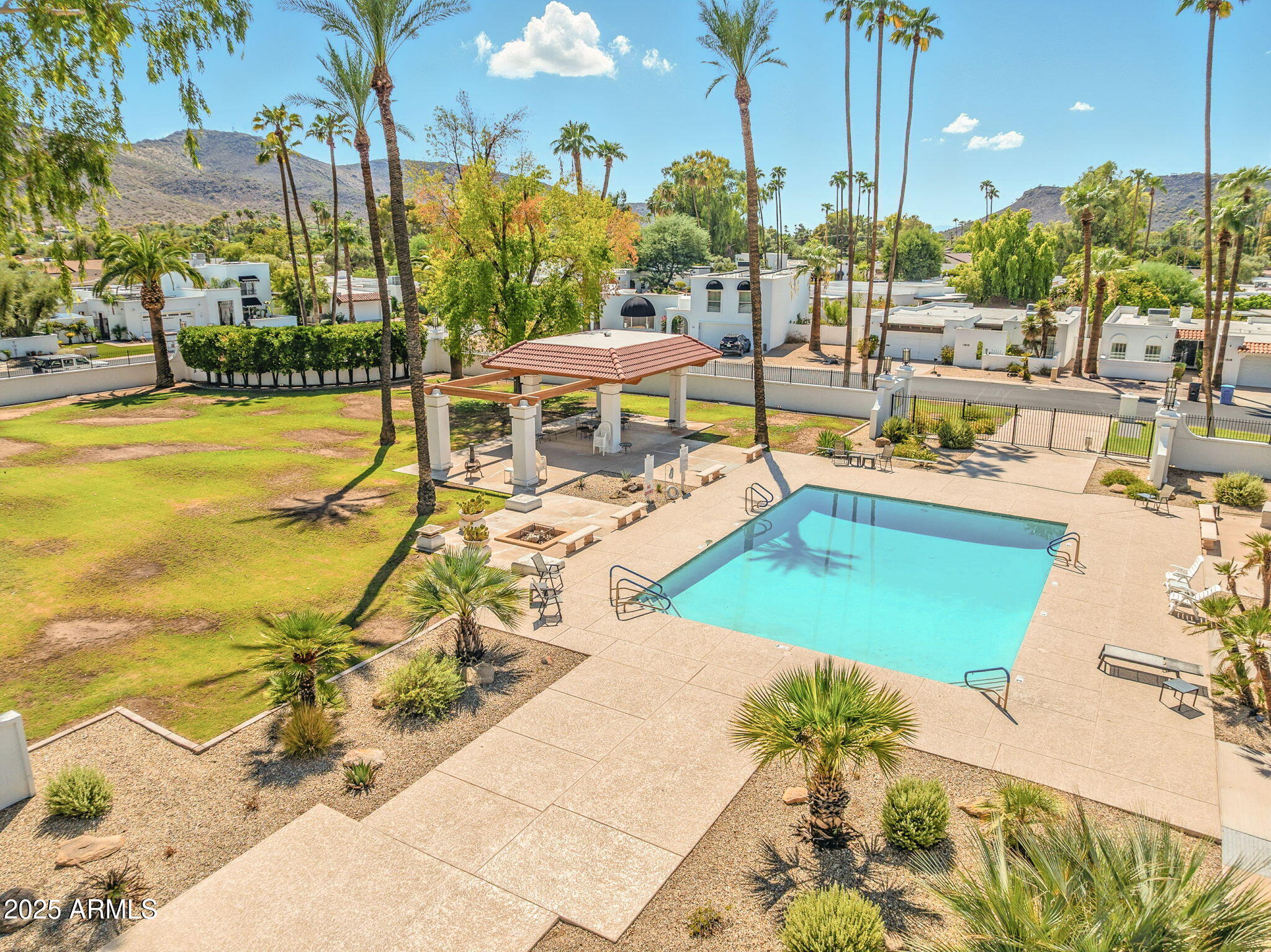 43 East Boca Raton Road Phoenix, AZ 85022 - Photo 98 of 99 a view of a swimming pool with outdoor seating