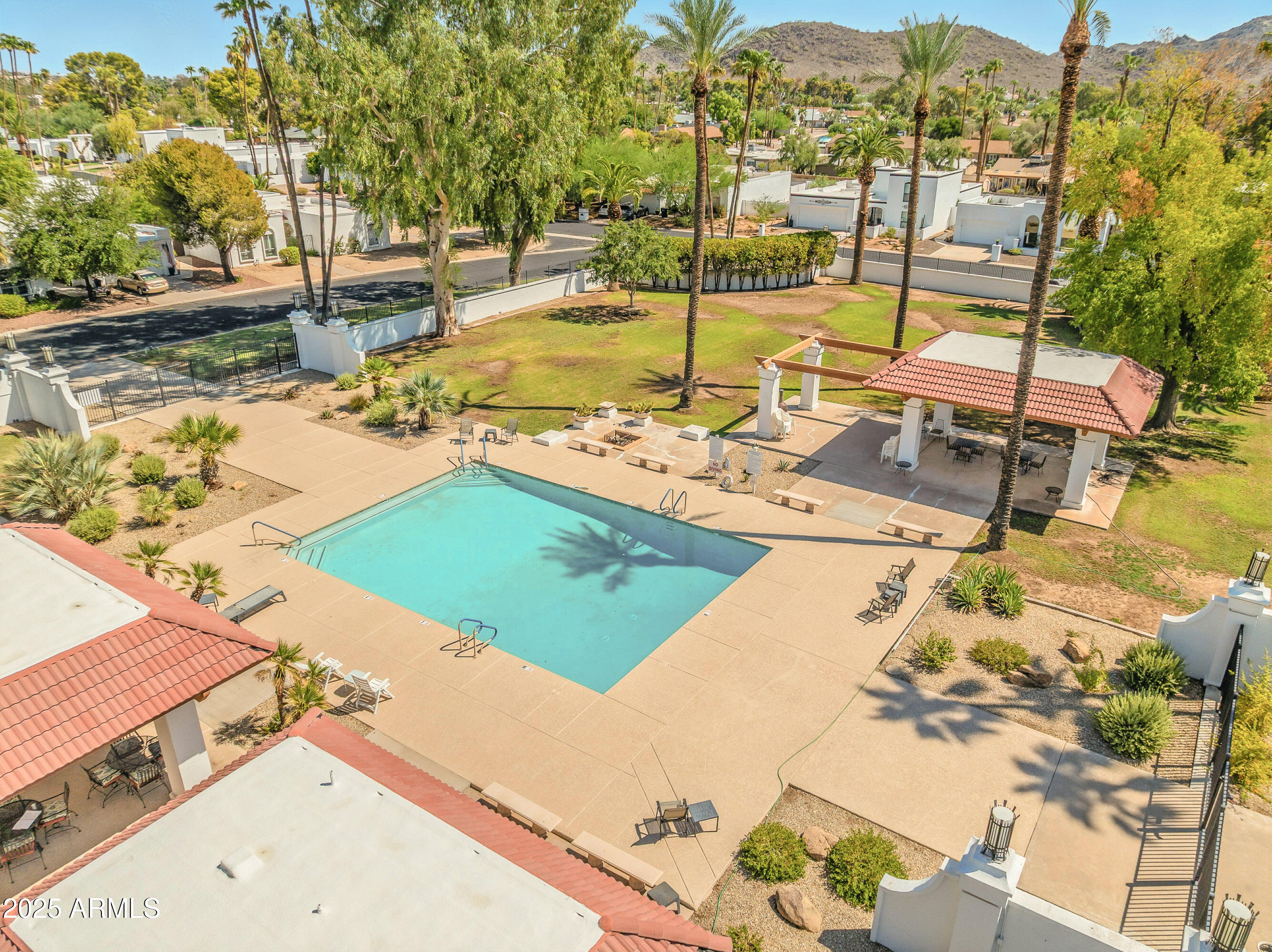 43 East Boca Raton Road Phoenix, AZ 85022 - Photo 99 of 99 a view of a swimming pool with a patio
