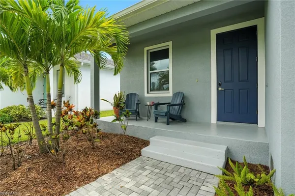 a building outdoor space with patio furniture