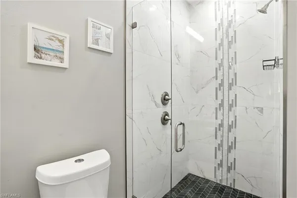 a view of small space with racks on the wall