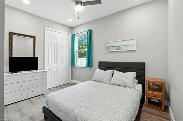 a bedroom with a bed and a view of bathroom