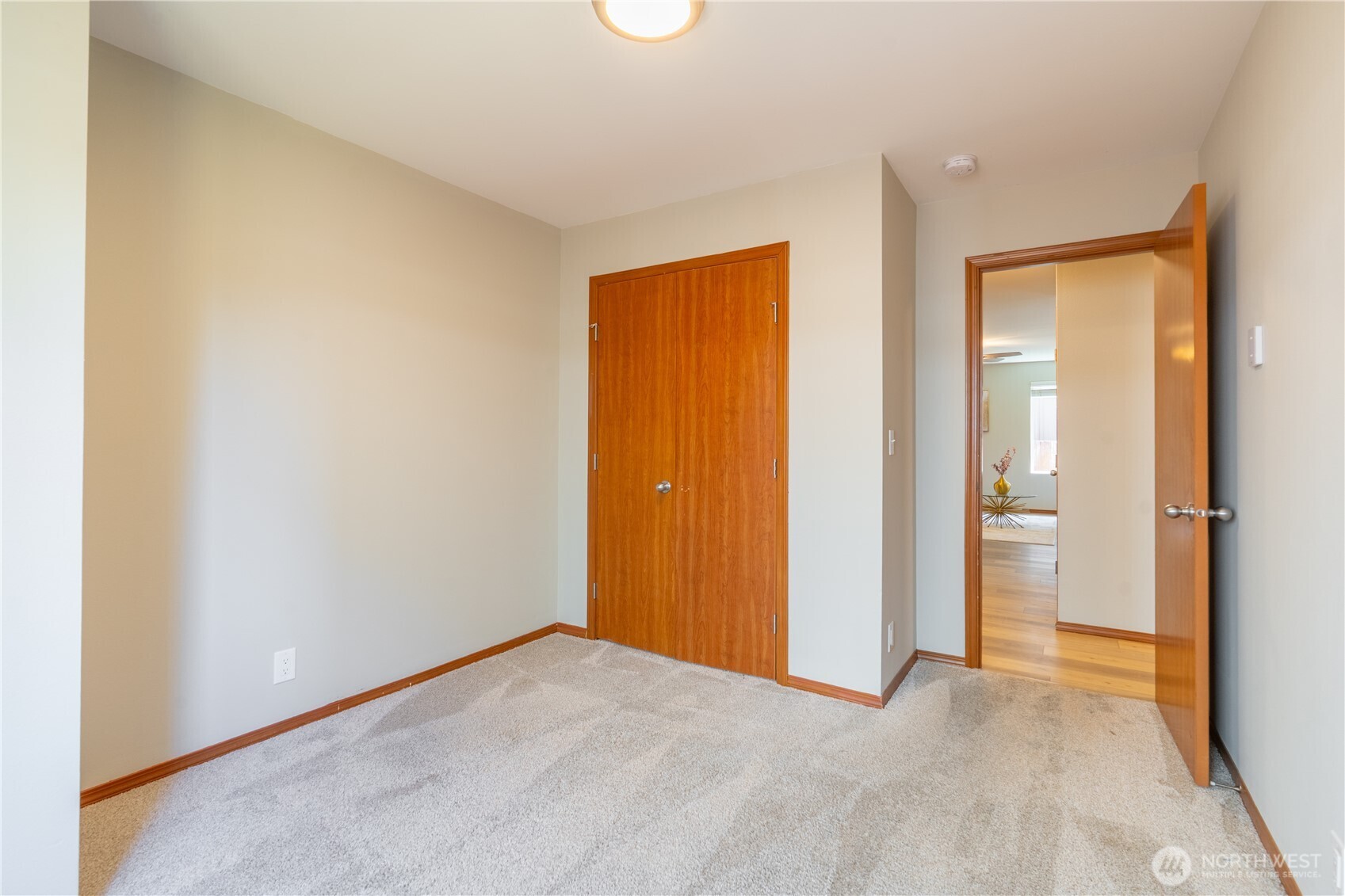 242 Riggs Drive East Enumclaw, WA 98022 - Photo 18 of 40 a view of an empty room with closet and a window