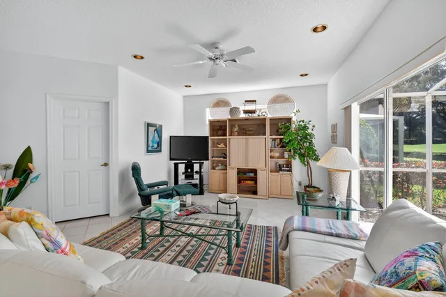 a bedroom with two beds and a table