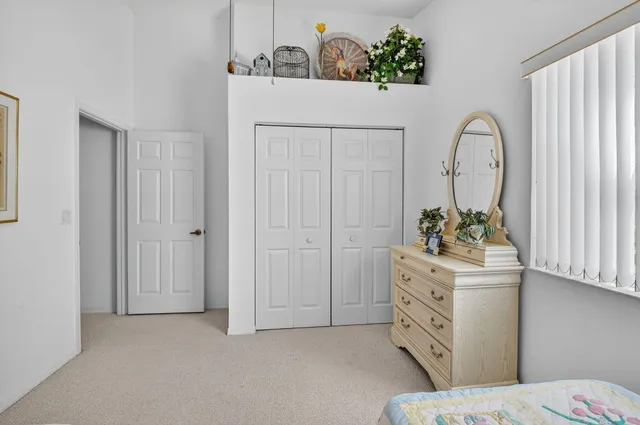 an aerial view of residential houses with outdoor space and street view