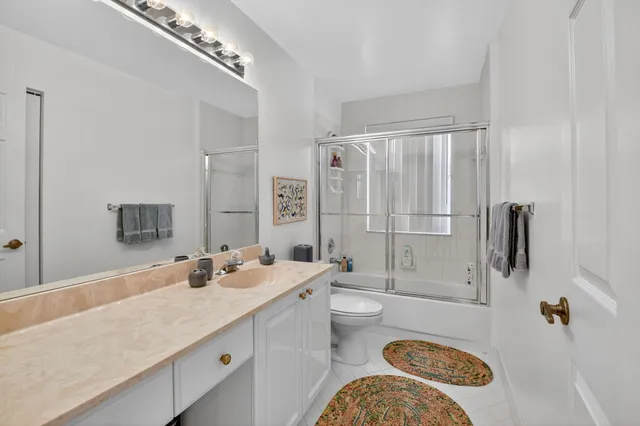 an aerial view of a house with a garden