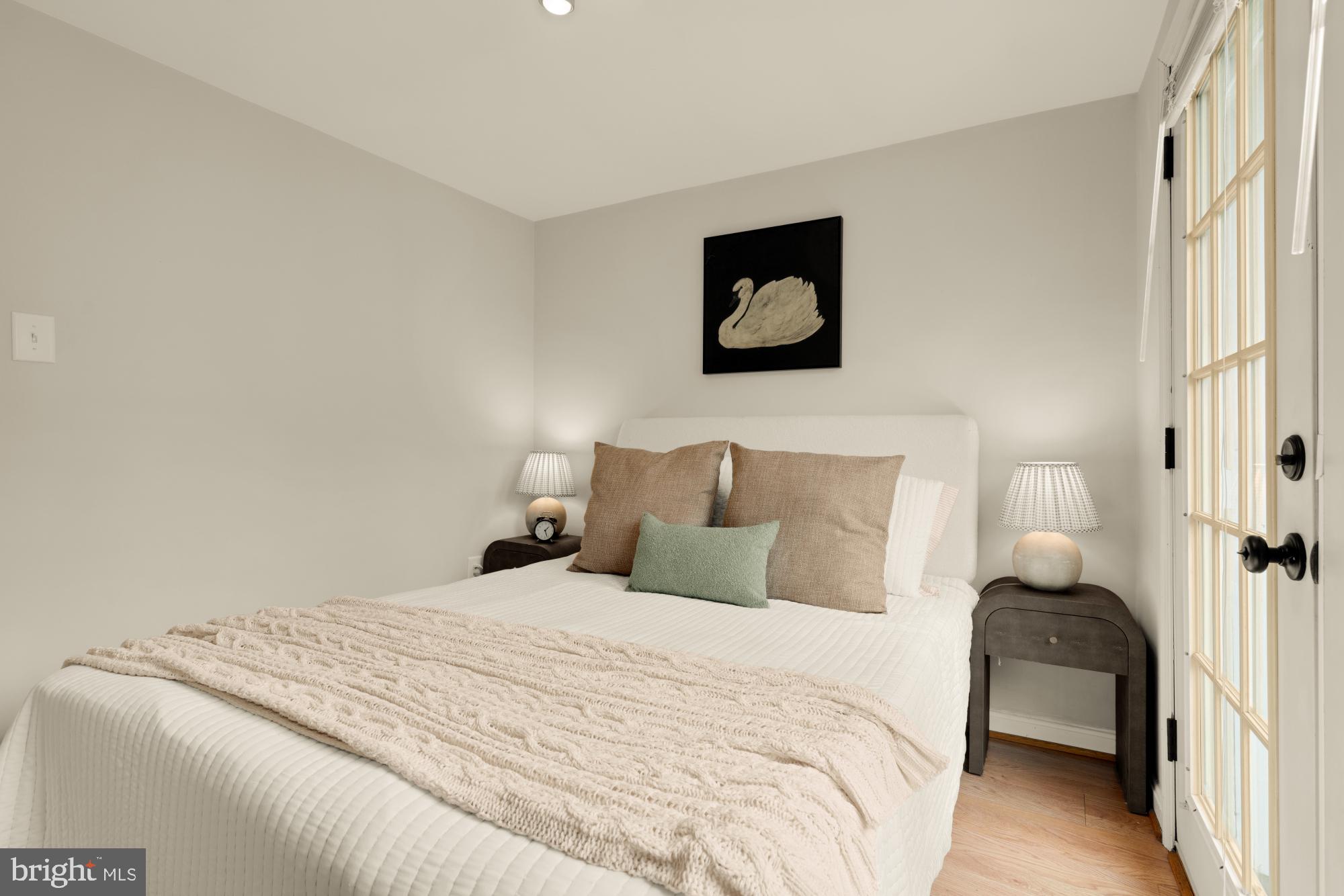 545 Gittings Street Baltimore, MD 21230 - Photo 20 of 40 a bedroom with a bed and a painting on the wall