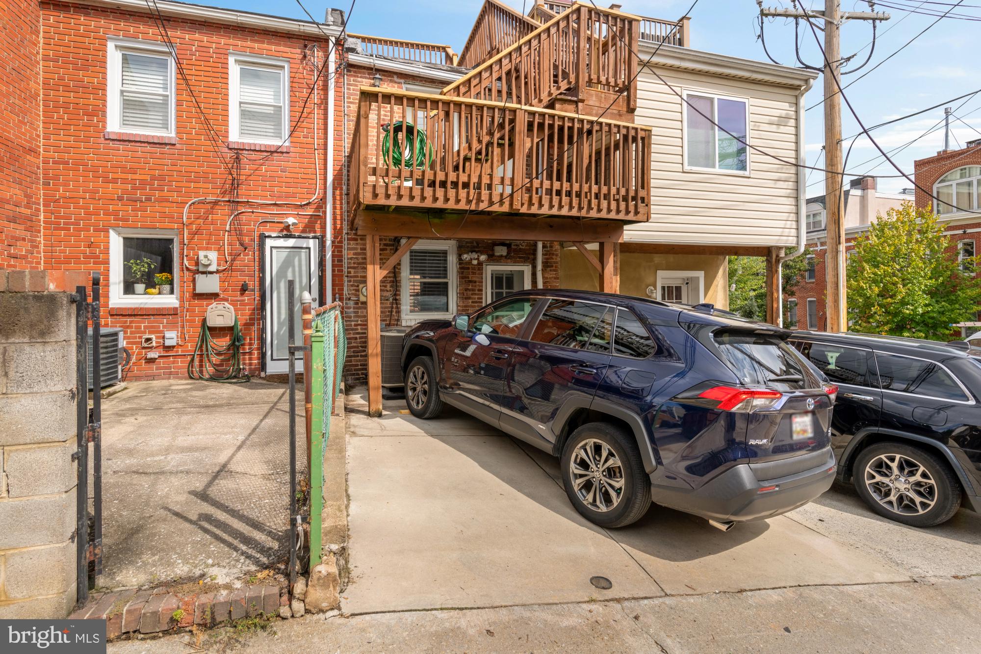 545 Gittings Street Baltimore, MD 21230 - Photo 3 of 40 a car parked in front of a building