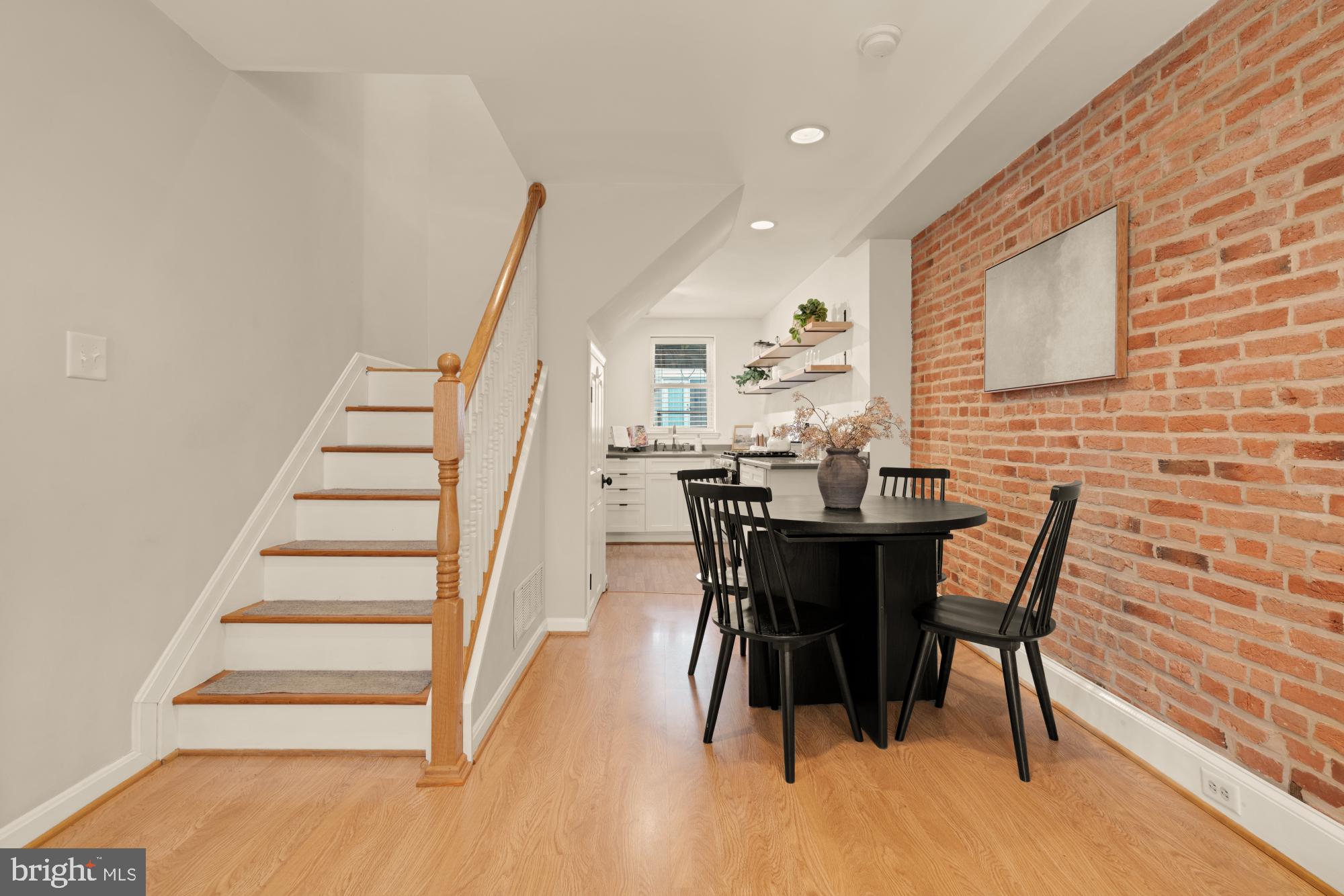 545 Gittings Street Baltimore, MD 21230 - Photo 6 of 40 a view of a dining room with furniture and wooden floor