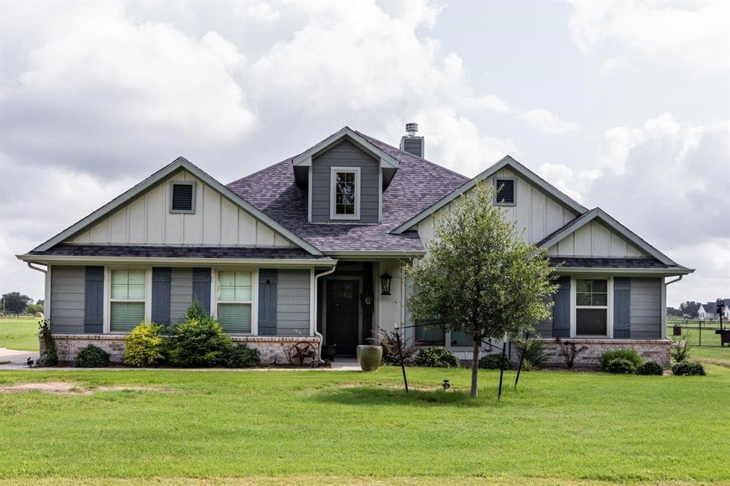 10393 County Road 346 Terrell, TX 75161 - Photo 2 of 29 a front view of a house with a yard