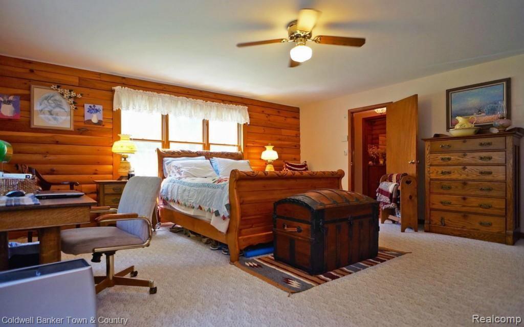 6255 North Owosso Road Fowlerville, MI 48836 - Photo 21 of 31 Large Master Bedroom Suite with 2 large windows for lots of natural sunlight!