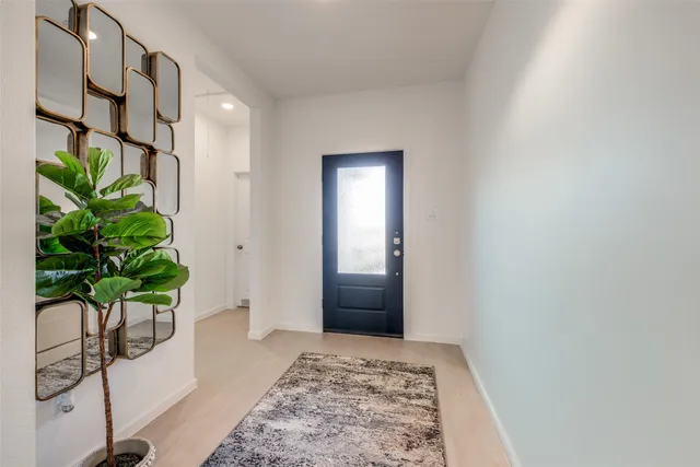 a view of entryway with a potted plant