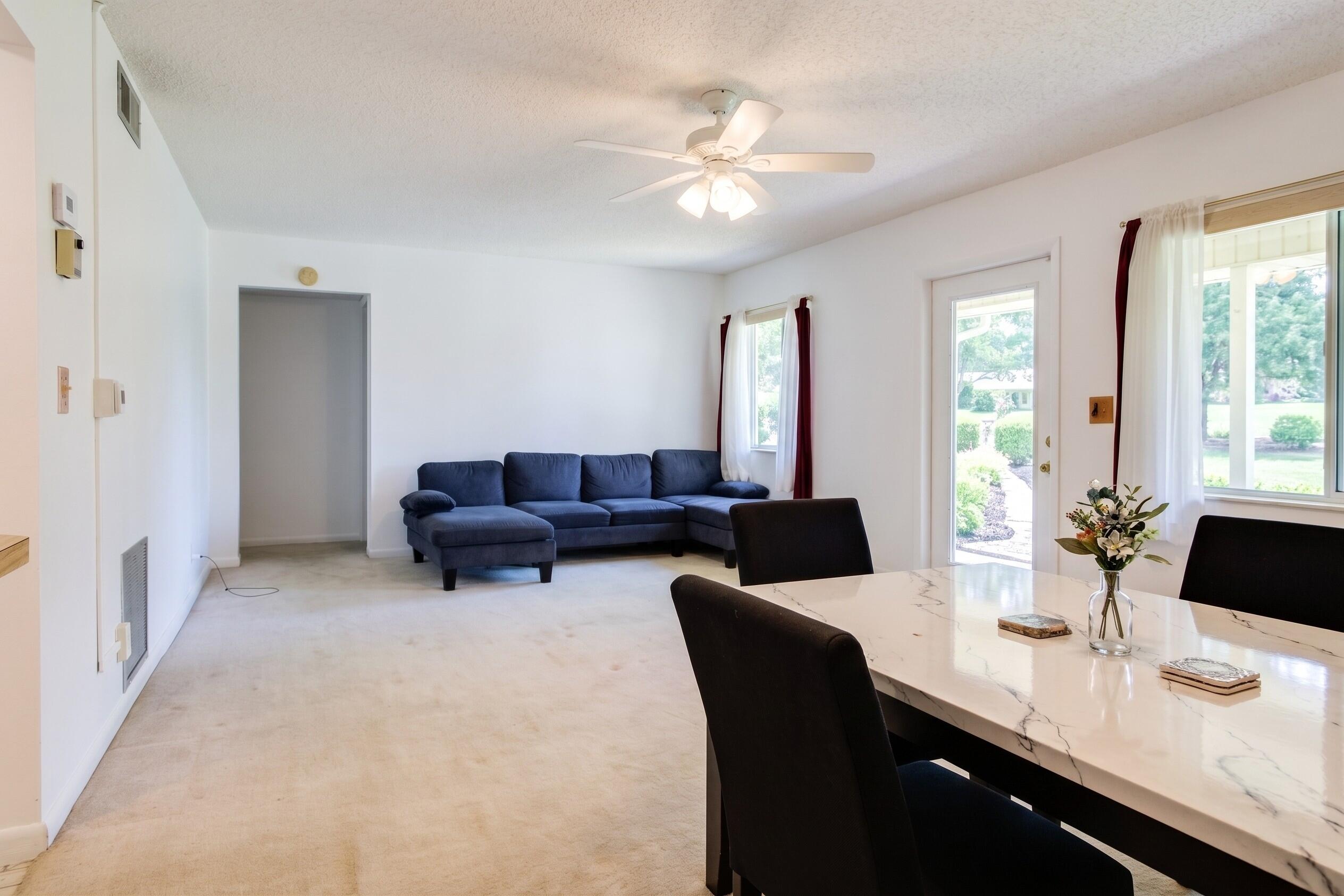 327 Pine Ridge Circle, Unit B2 Greenacres, FL 33463 - Photo 4 of 18 Living Dining Room