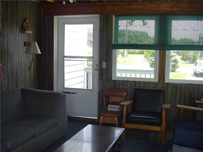 71 Crosspatch Road Charlestown, RI 02813 - Photo 7 of 13 Porch. 3 season room adds extra living area