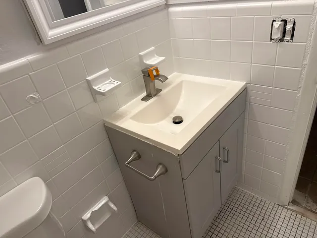 a bathroom with a sink and a vanity