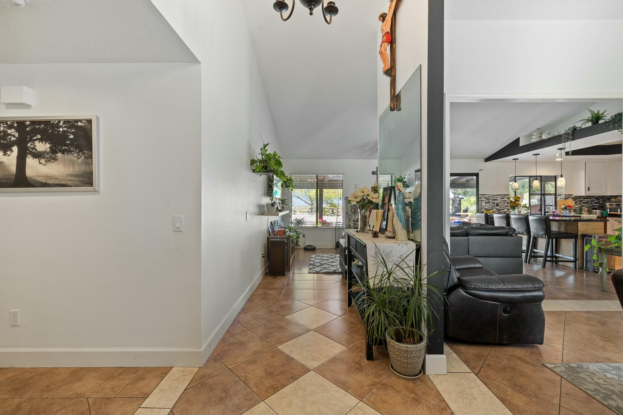 36070 43rd Street East Palmdale, CA 93552 - Photo 9 of 53 a hallway with dining area and livingroom view