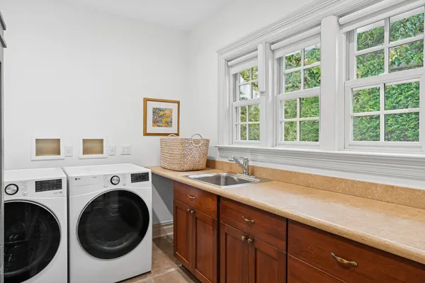 a utility room with dryer and washer
