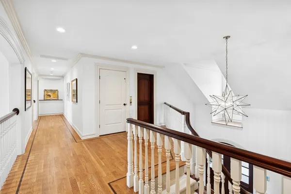 a view of a hallway view with staircase