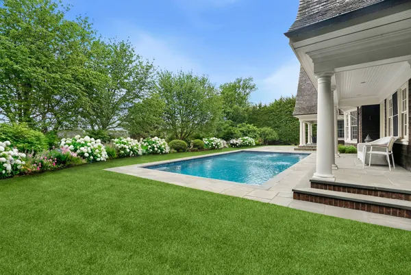 a view of a house with a swimming pool