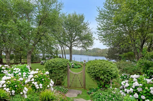 a backyard of a house with lots of green space