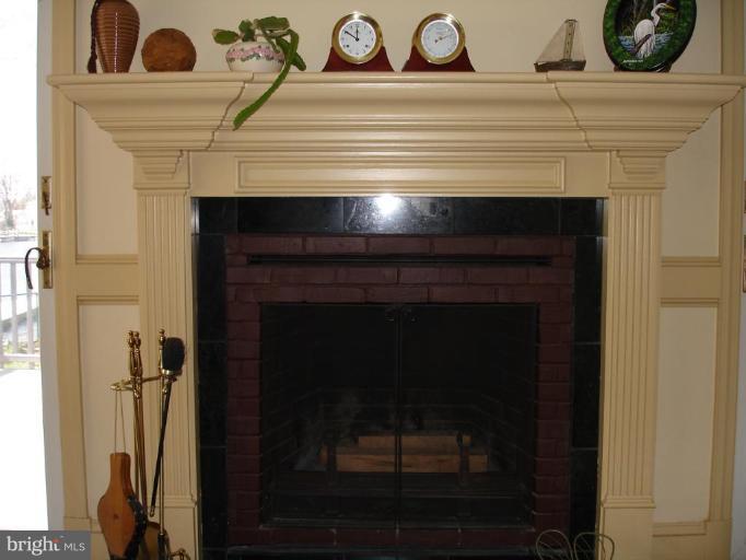 8109 Shore Road Dundalk, MD 21222 - Photo 11 of 30 Elegant and Comforting Wood Burning Fireplace