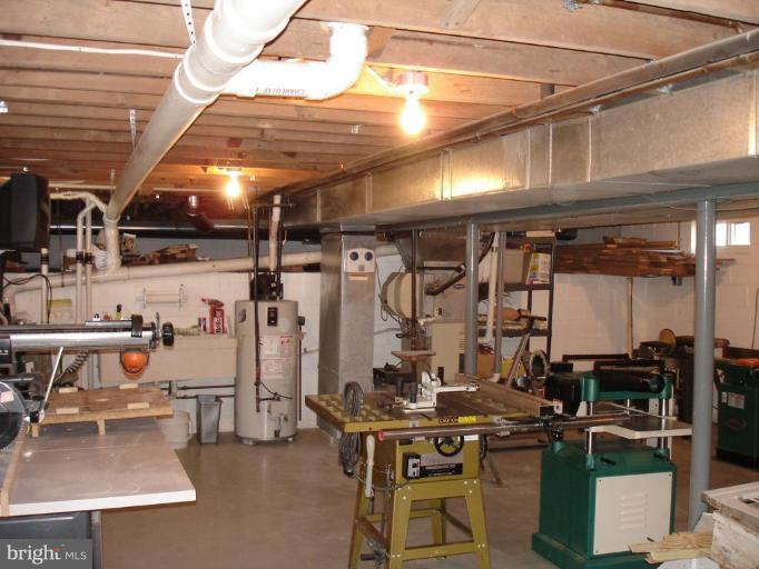 8109 Shore Road Dundalk, MD 21222 - Photo 21 of 30 31x22 Basement Workshop- Clean and Dry