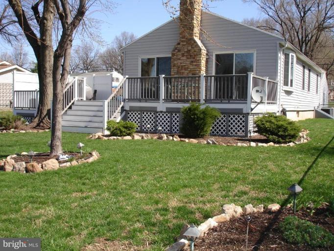 8109 Shore Road Dundalk, MD 21222 - Photo 6 of 30 Waterfront Side of Home w/Decks and Gardens