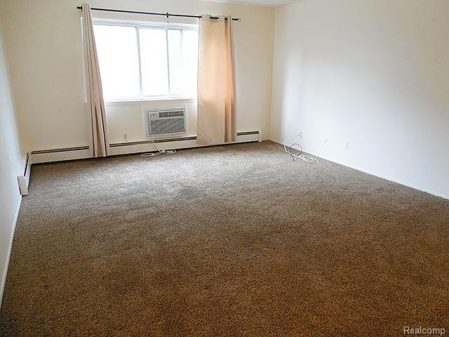 803 Plate Street, Unit 32/205 Rochester, MI 48307 - Photo 3 of 9 PlateLR, 803.jpg