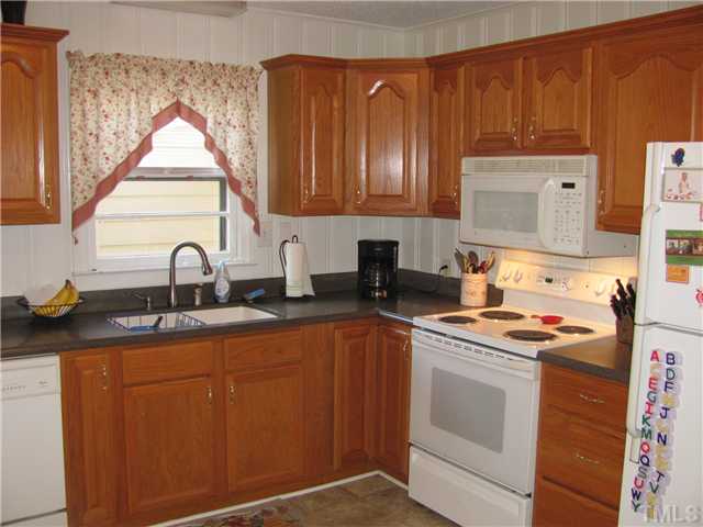 2904 Lucerne Place Raleigh, NC 27604 - Photo 8 of 24 White appliance package to include microwave.