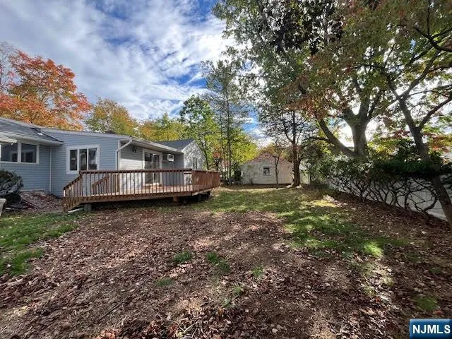 a house view with a backyard space