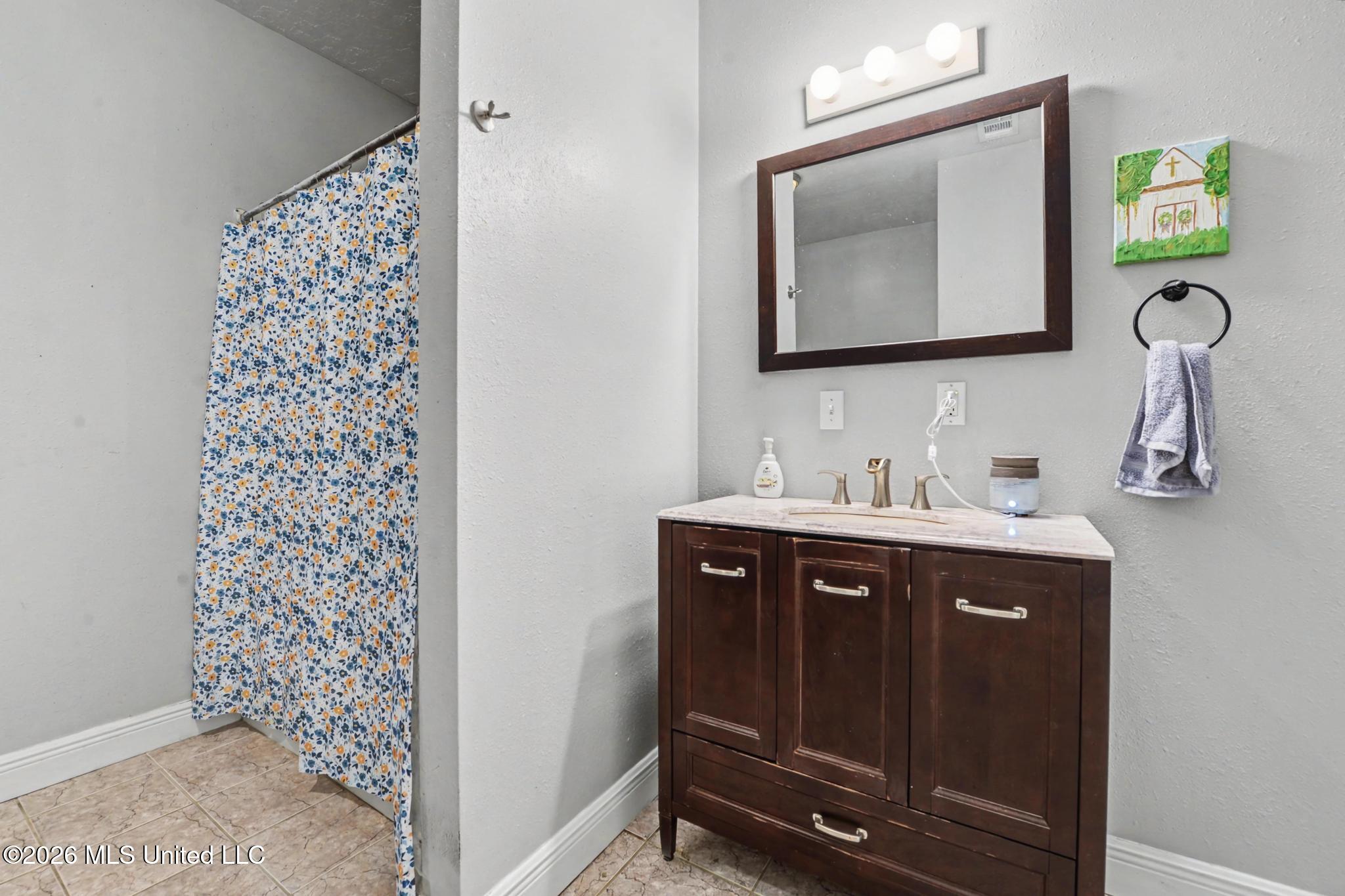 18 Jub Hickman Road Perkinston, MS 39573 - Photo 15 of 22 Guest Bathroom