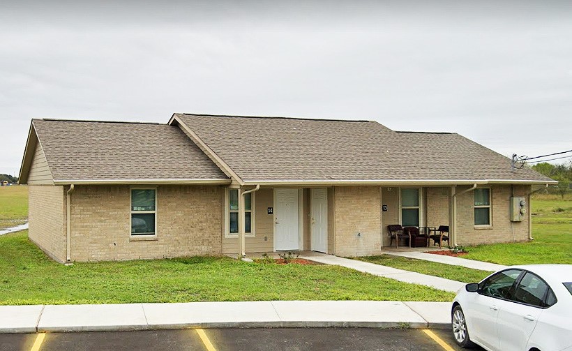 500 West Freeman Street Mathis, TX 78368 - Photo 4 of 9 a house view with a garden space