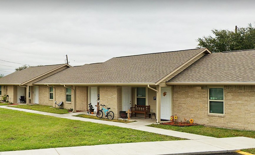 500 West Freeman Street Mathis, TX 78368 - Photo 5 of 9 a front view of a house with a yard
