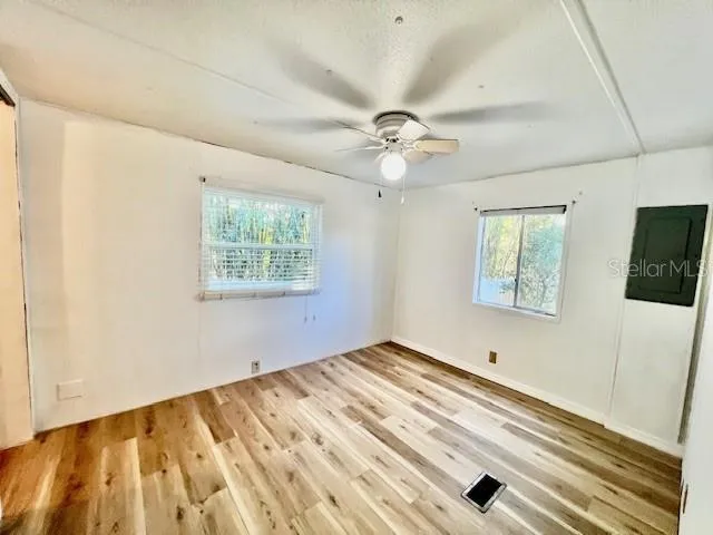 a view of a room with racks on the wall