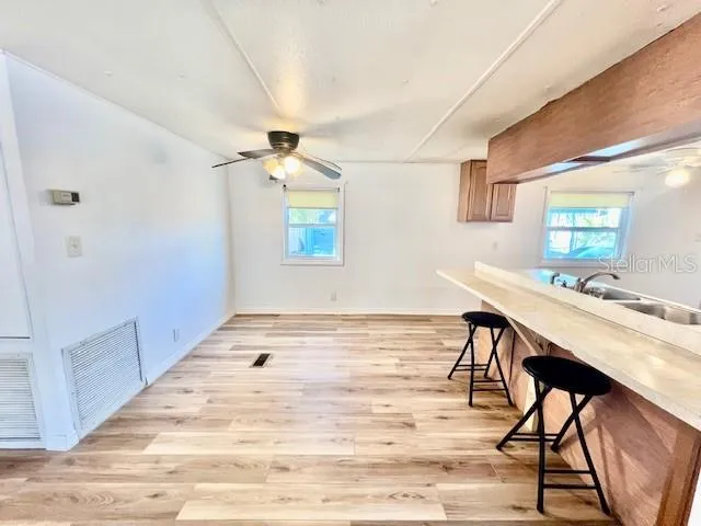 a room with a table and chairs