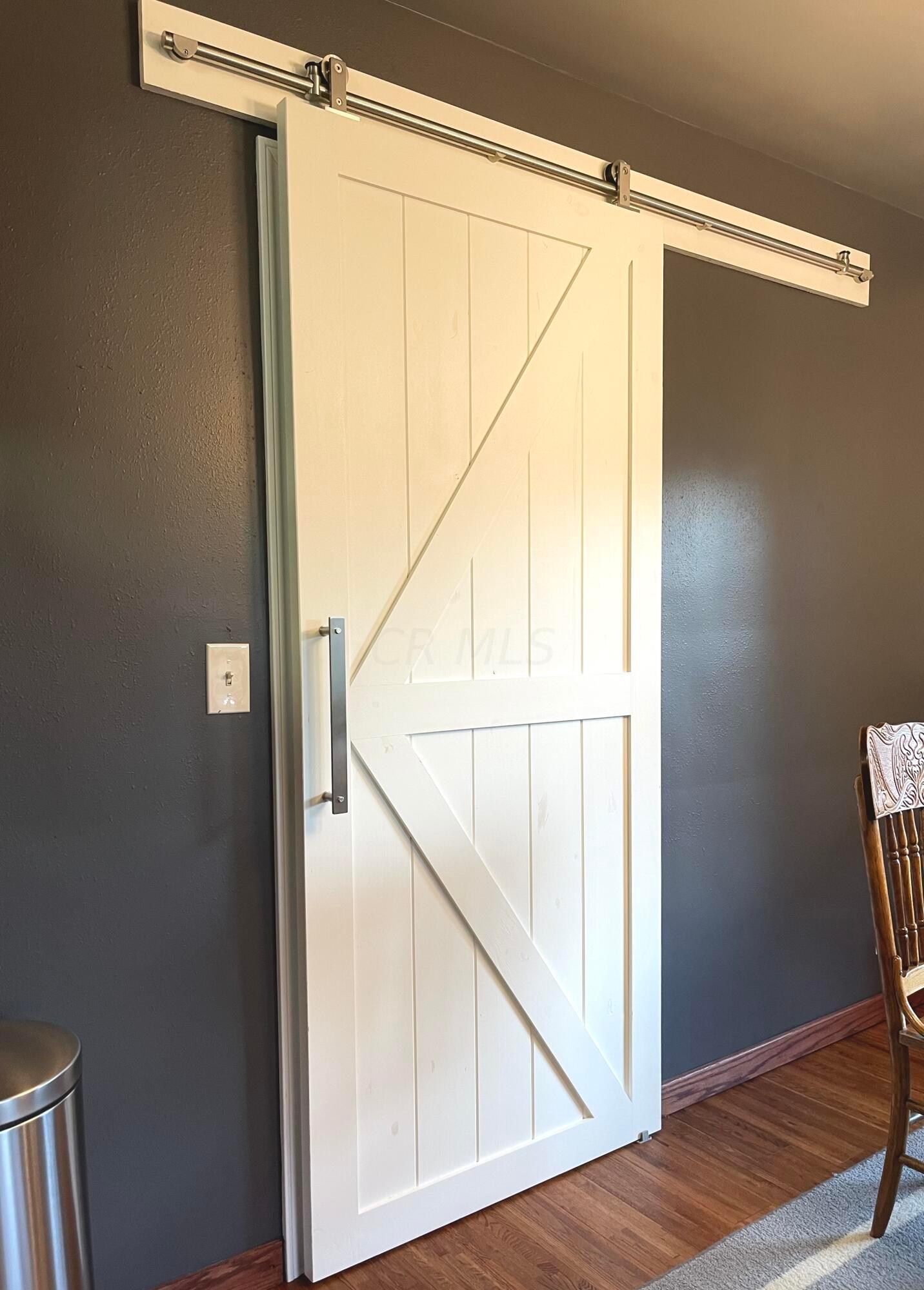 990 Winchester Road Galion, OH 44833 - Photo 24 of 48 Barn door from kitchen to living room