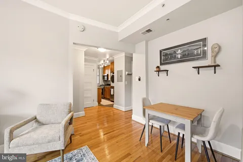 a view of a livingroom with furniture and wooden floor