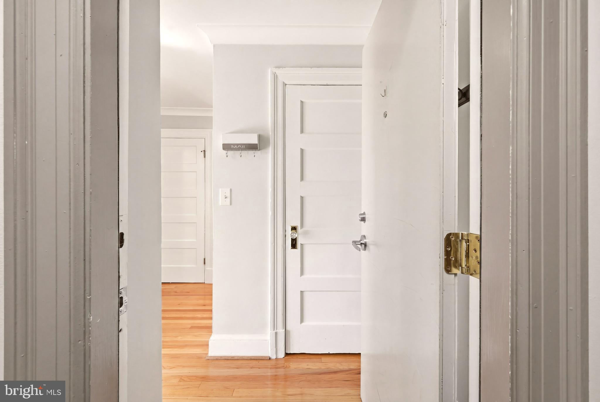 3500 13th Street Northwest, Unit 107 Washington, DC 20010 - Photo 5 of 28 a view of a bathroom from a hallway