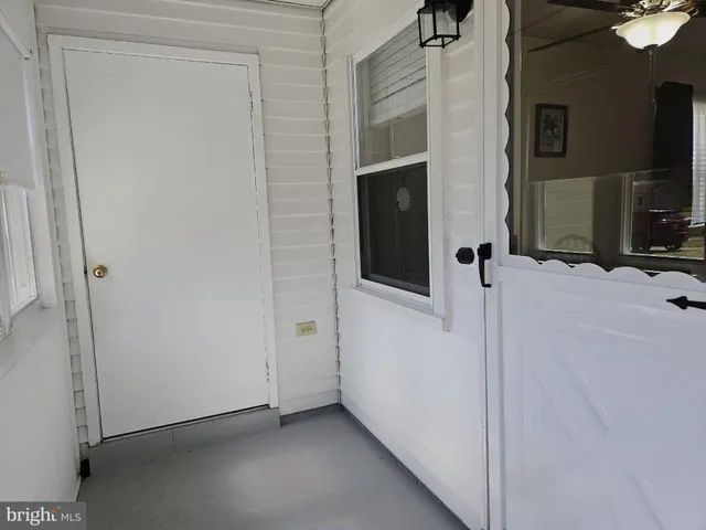 a view of a house with a yard and garage