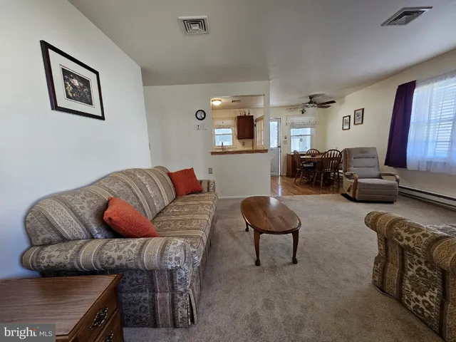 a living room with furniture and a couch