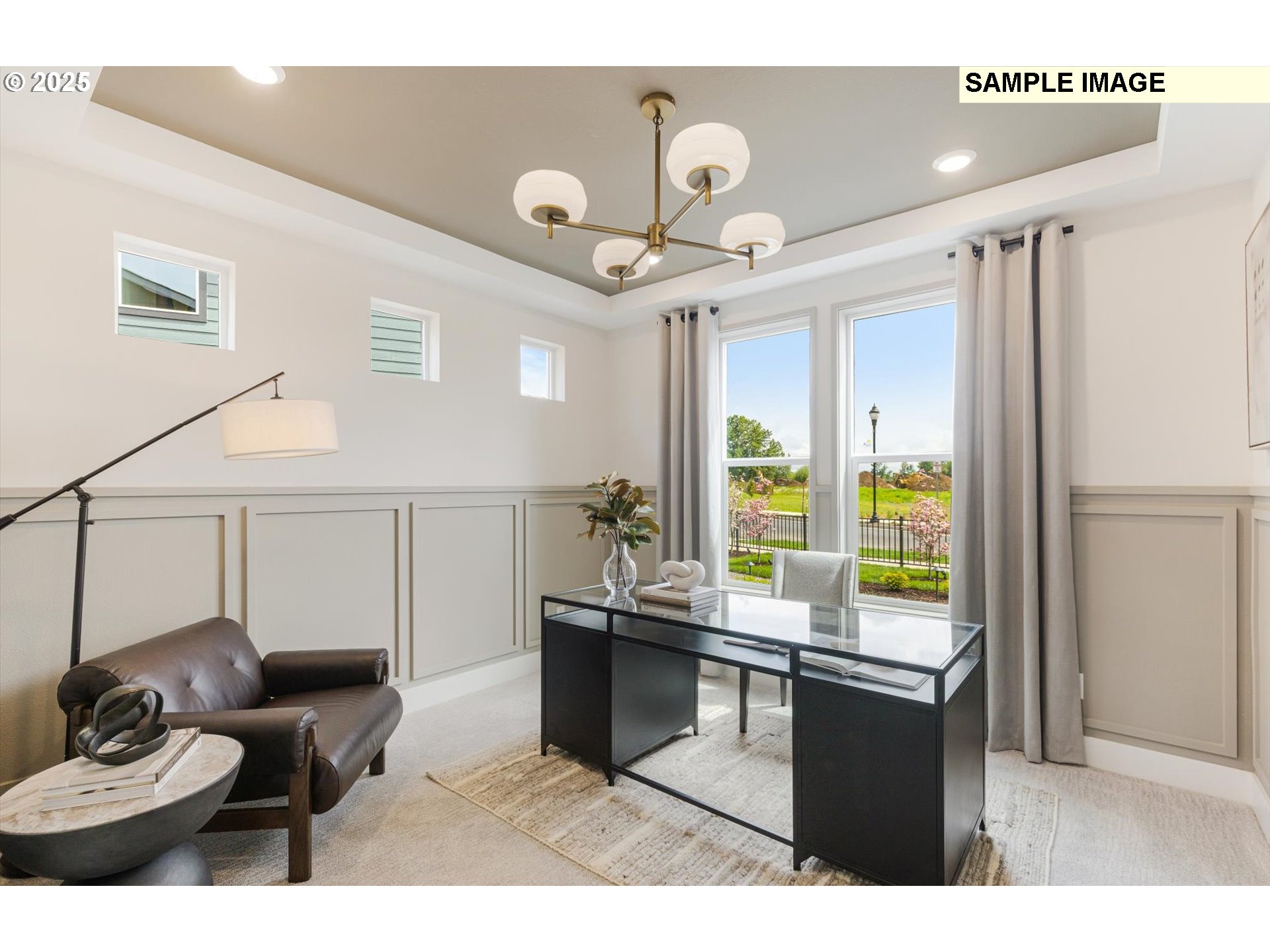 8705 South 4th Way Ridgefield, WA 98642 - Photo 2 of 26 a room with furniture and a large window