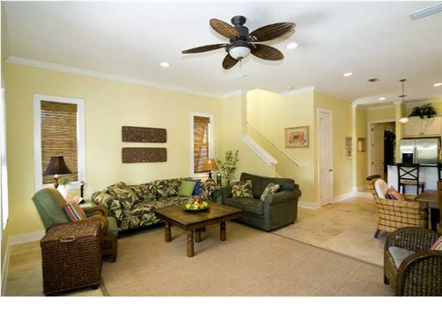 9 Blue Crab Loop Seacrest, FL 32461 - Photo 14 of 28 a living room with furniture and a large window