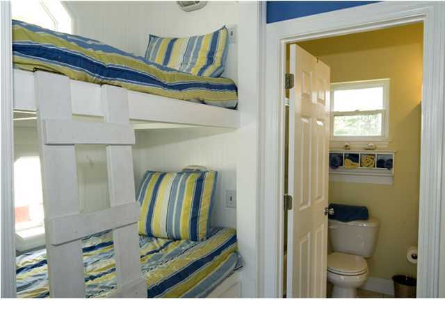9 Blue Crab Loop Seacrest, FL 32461 - Photo 25 of 28 a bathroom with a sink toilet and shower
