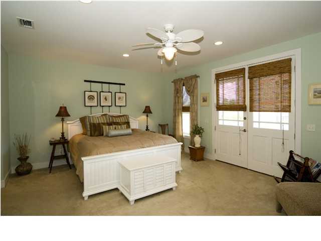 9 Blue Crab Loop Seacrest, FL 32461 - Photo 5 of 28 a bedroom with a bed and window