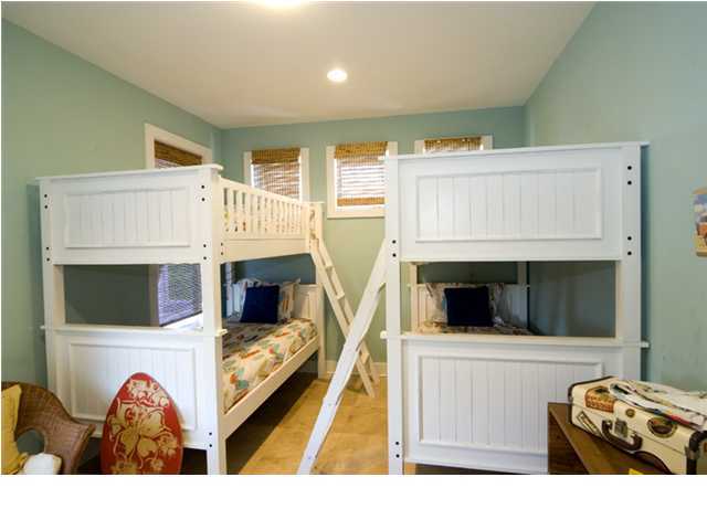 9 Blue Crab Loop Seacrest, FL 32461 - Photo 8 of 28 a living room with furniture and a fireplace