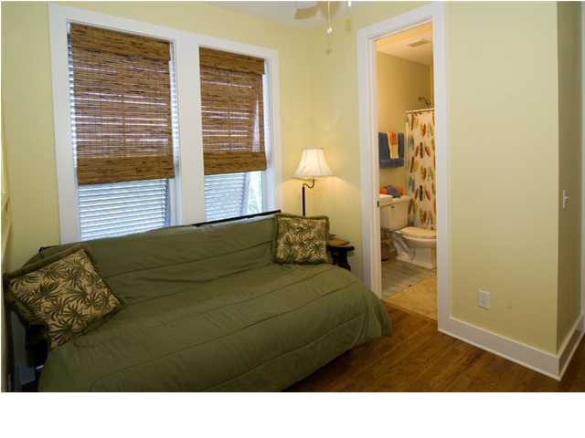 9 Blue Crab Loop Seacrest, FL 32461 - Photo 10 of 28 a room with a bed window and a walk in closet