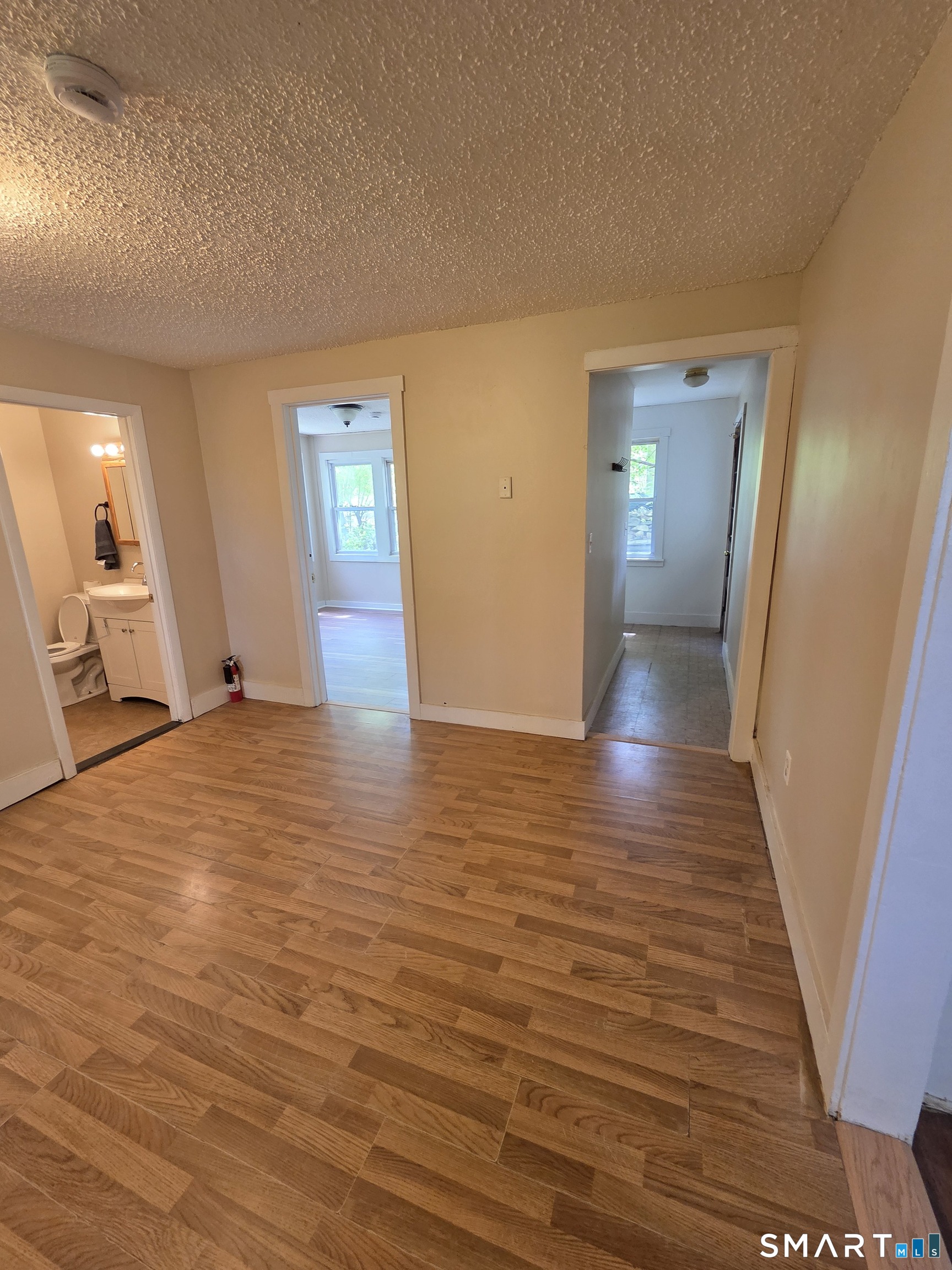 22 Lakeview Street, Unit 1 East Hampton, CT 06424 - Photo 11 of 20 a view of empty room with wooden floor